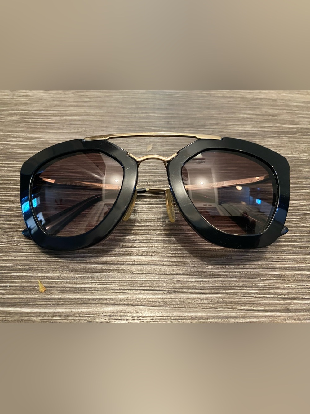 Prada Black Frame Cat-Eye Sunglasses with Gold Bridge - Picture 2 of 7